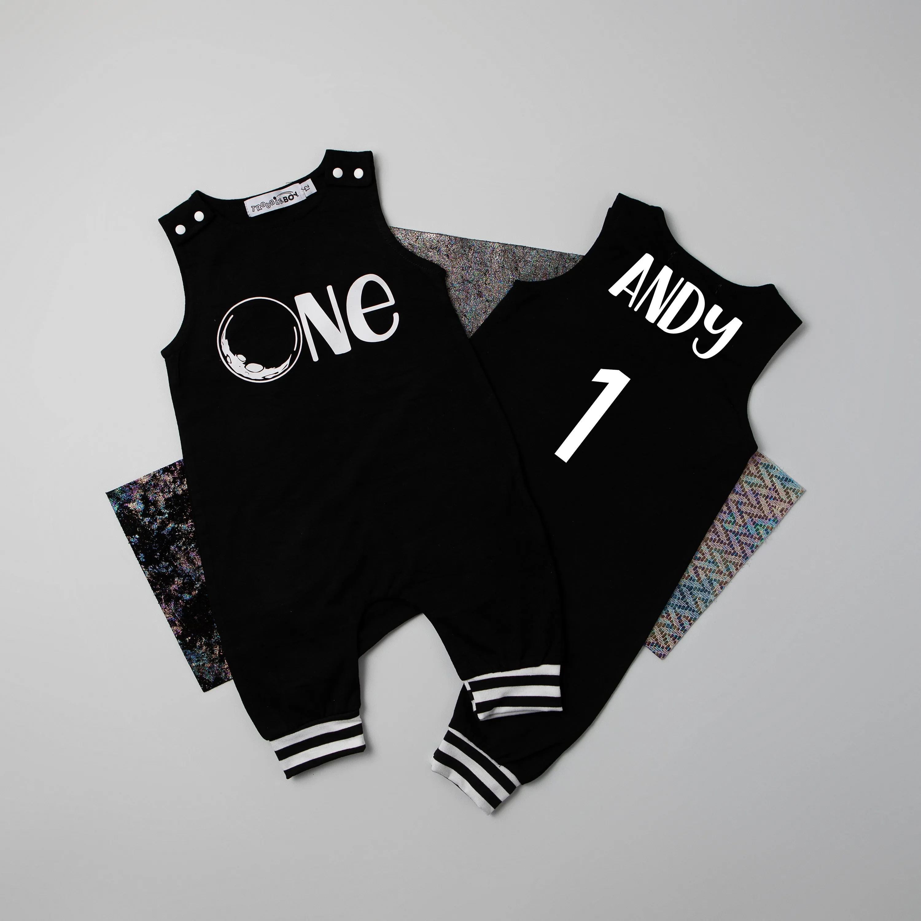 Gray "One" Space Themed First Birthday Romper with Striped Cuff