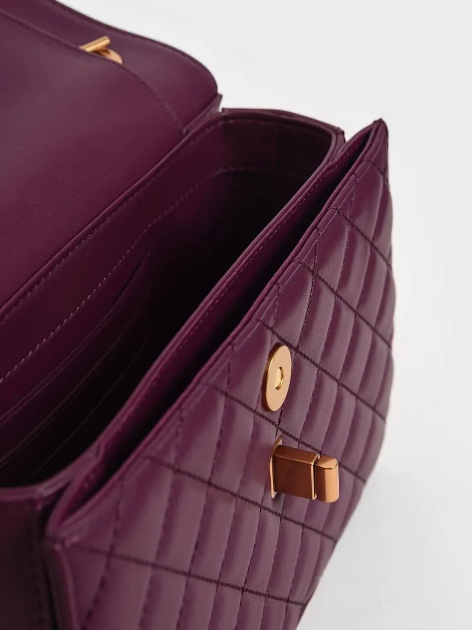 Quilted Turn-Lock Clutch