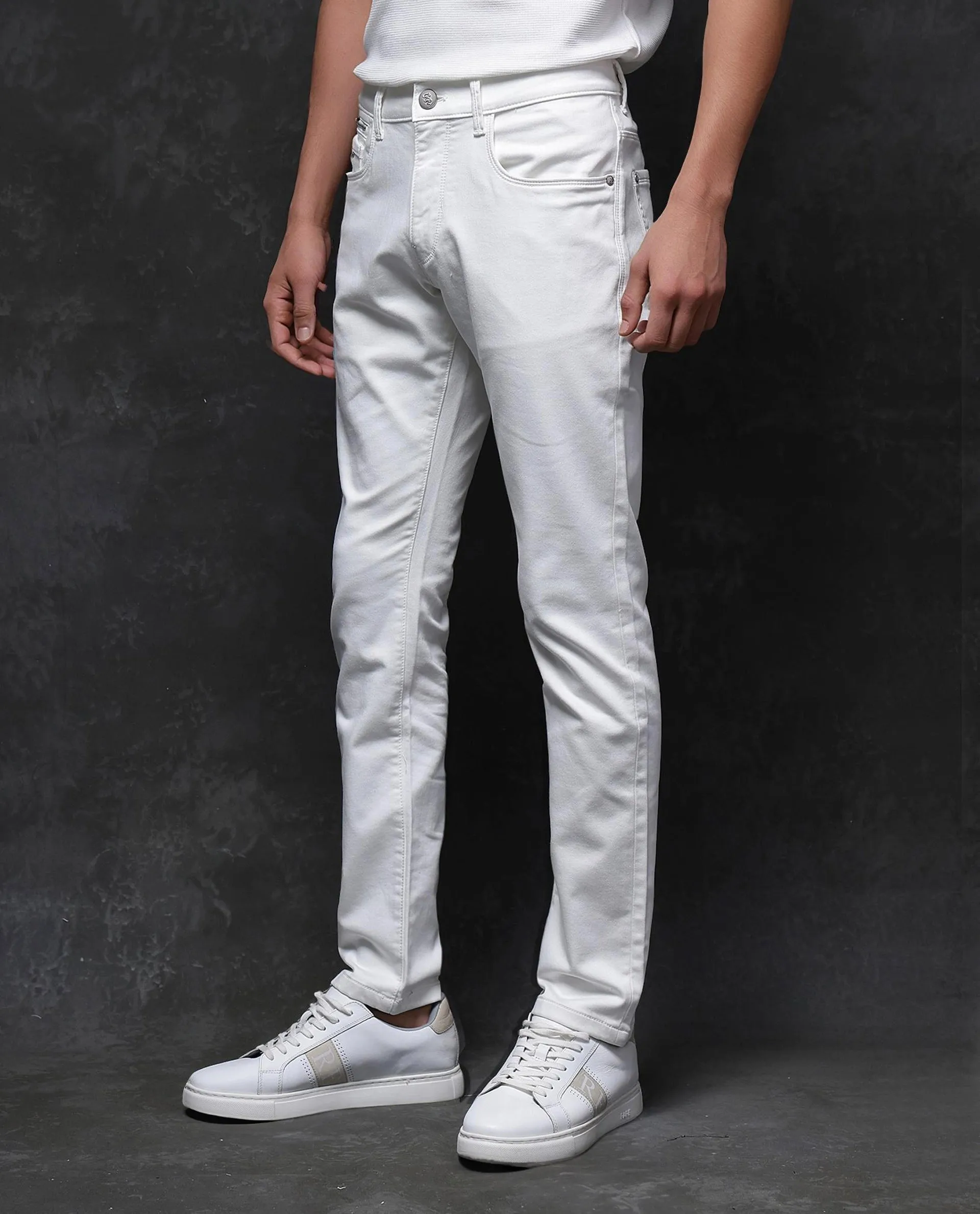 Rare Rabbit Men Corvo Off White Cotton Polyester Fabric Slim Fit Plain Denim Pant