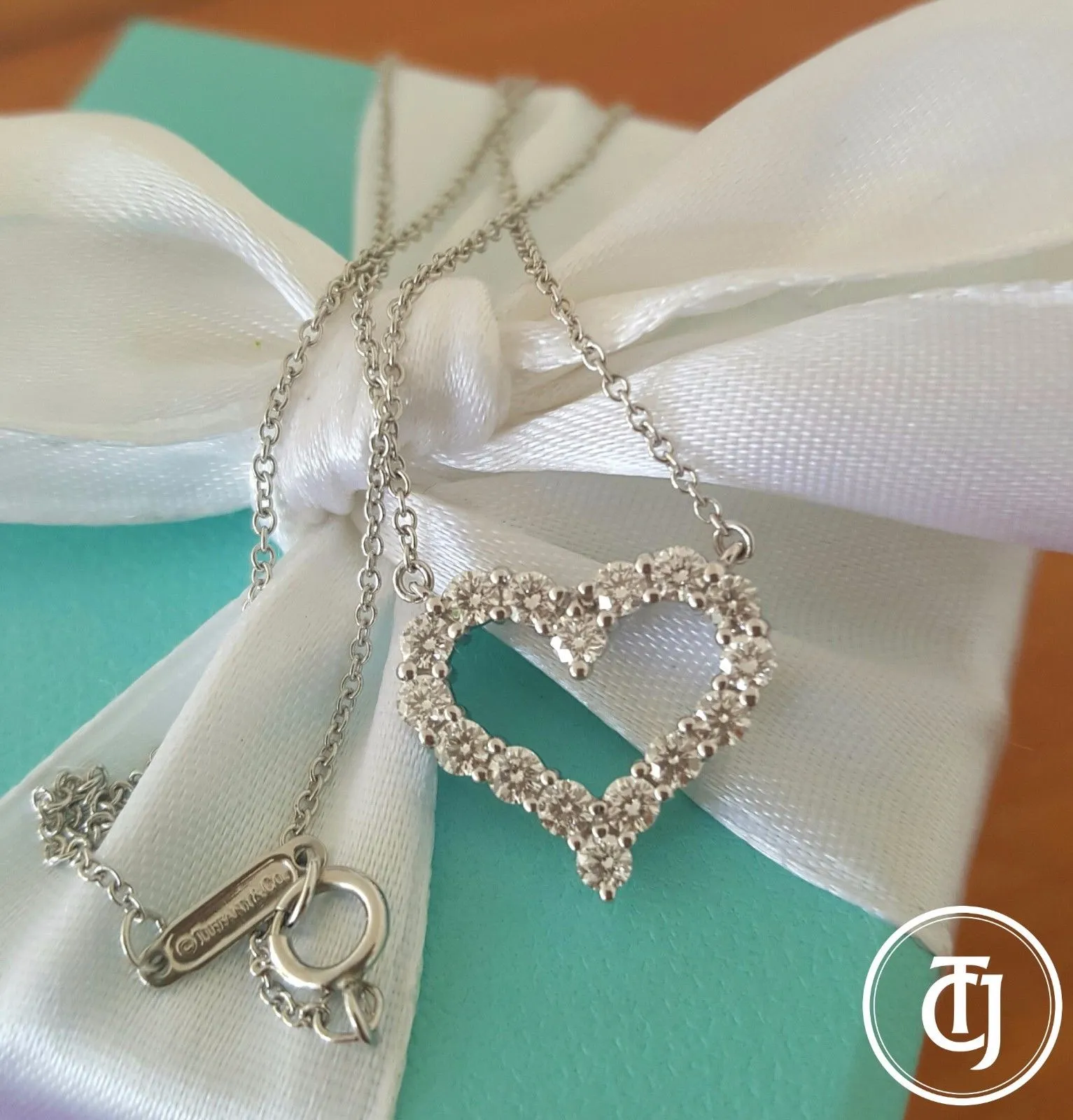 Tiffany & Co. 0.62tcw Diamond Pinched Heart Pendant/Necklace Platinum 16" Chain